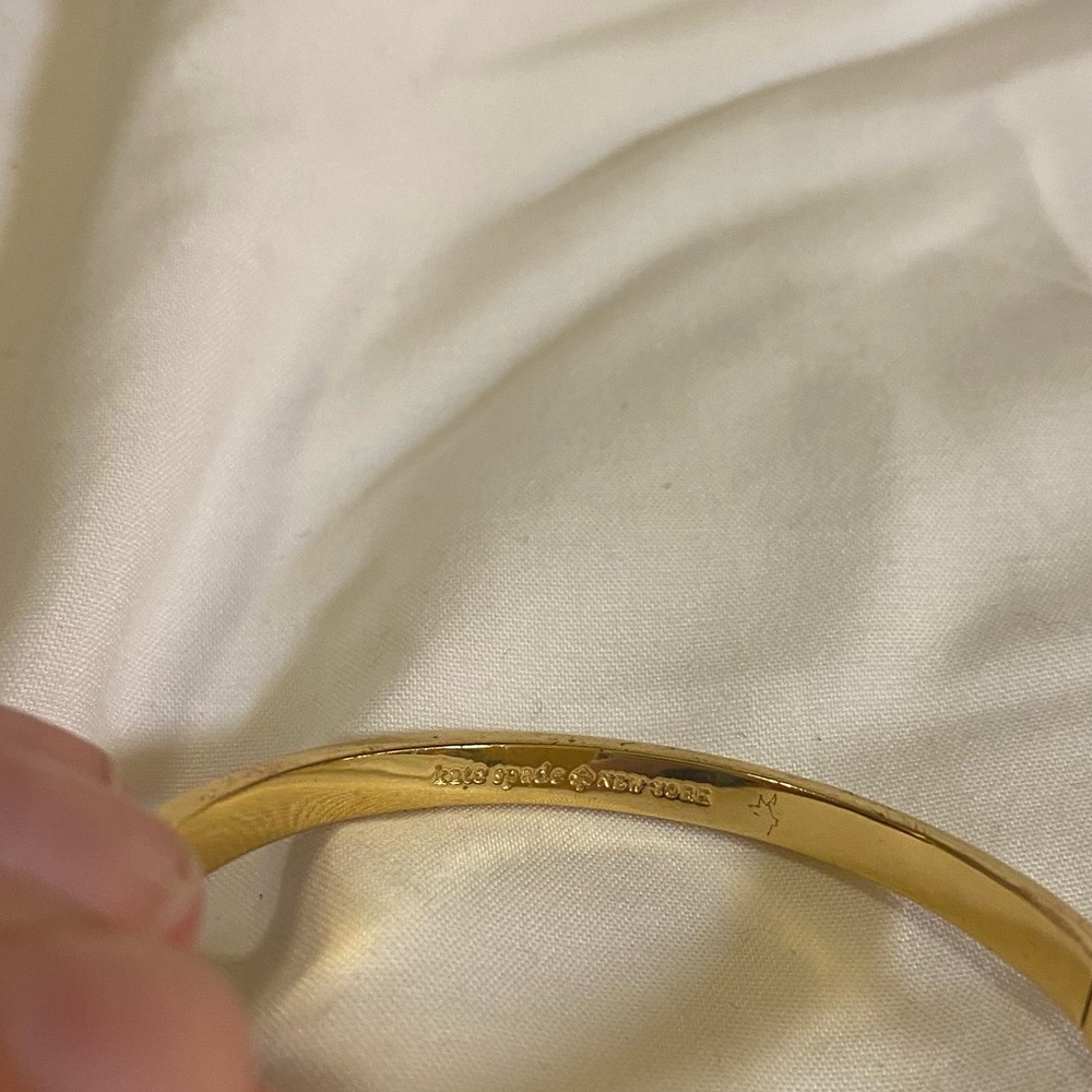 Kate Spade New York Gold and White Clasp Bracelet - Picture 2 of 4